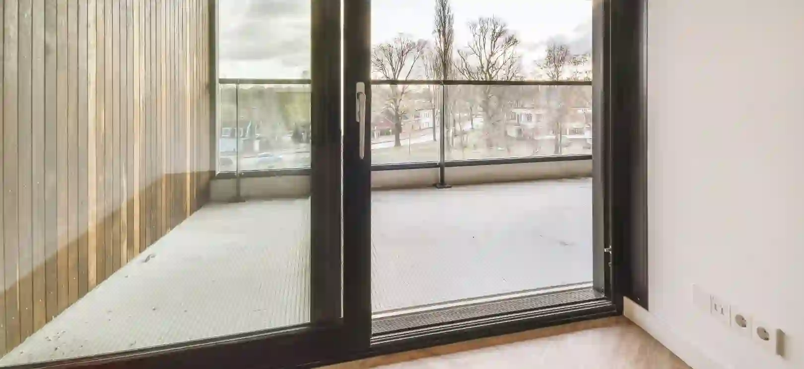 Portes coulissantes aluminium Kaisen SA — grandes baies vitrées et design épuré